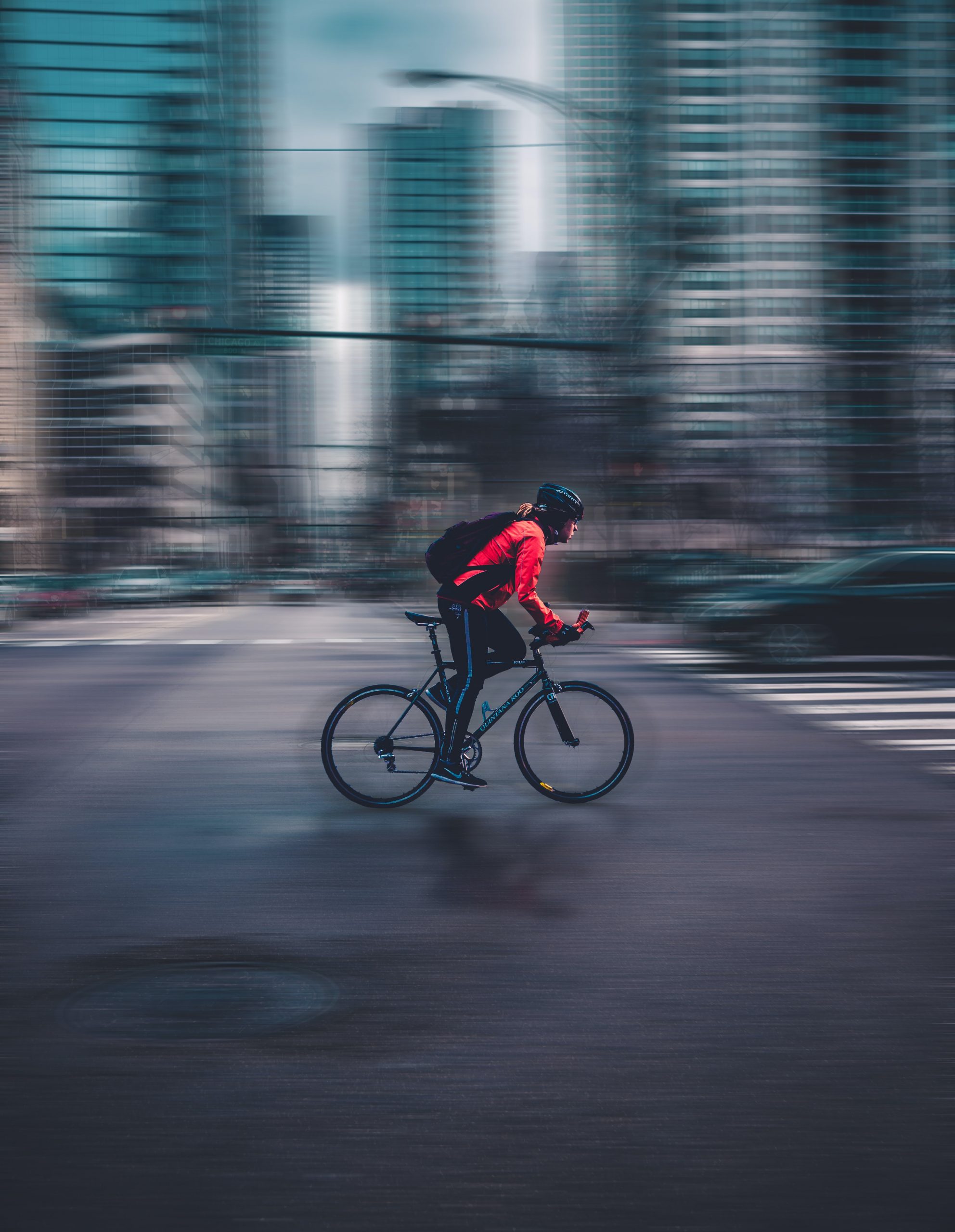 a person cycling in a city