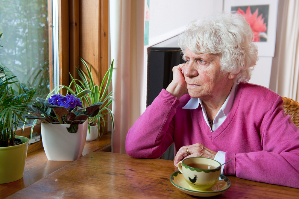 Lonely old woman in negligent nursing home